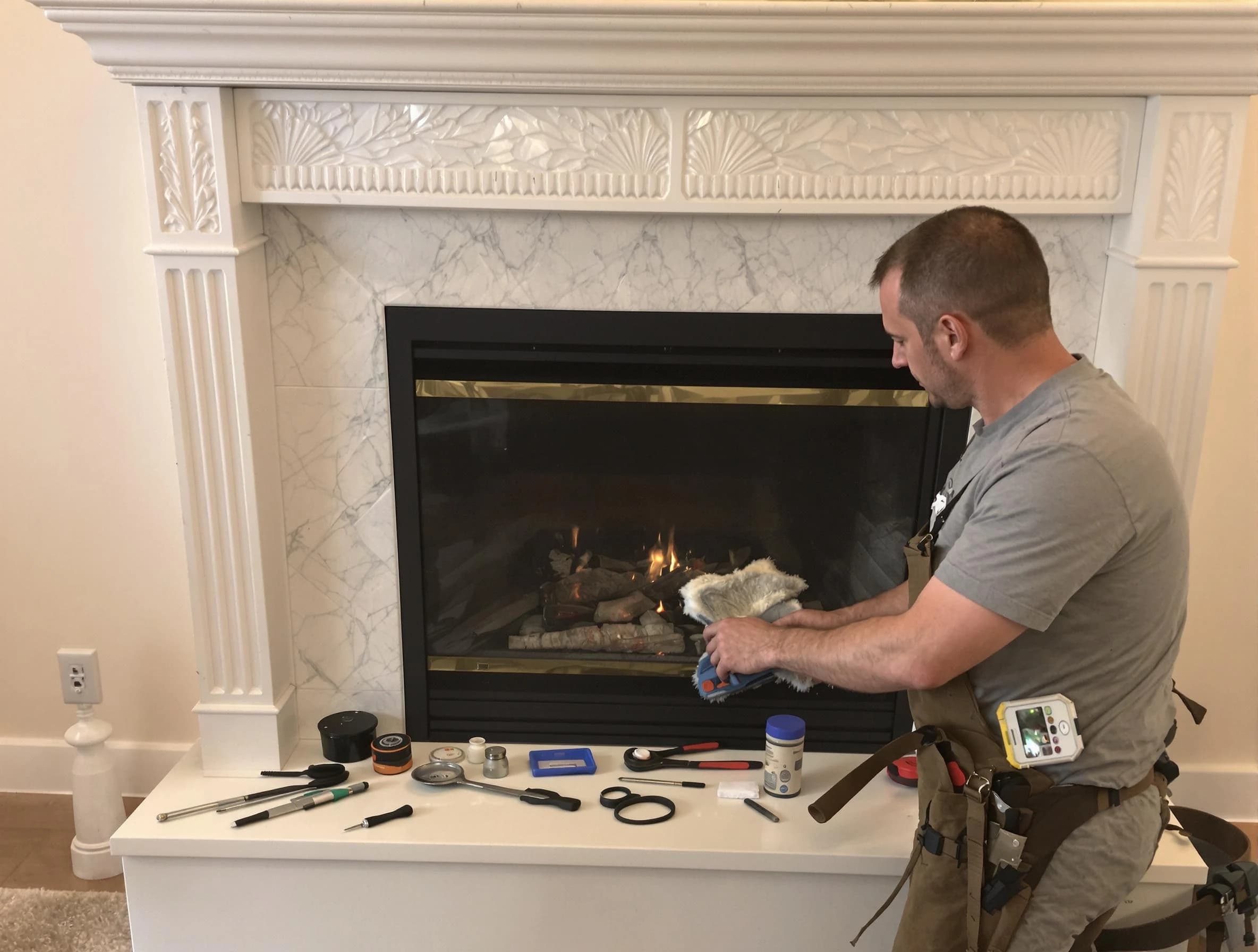 North Providence Chimney Sweep performing fireplace maintenance in North Providence, RI